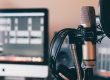 black and silver headphones on black and silver microphone